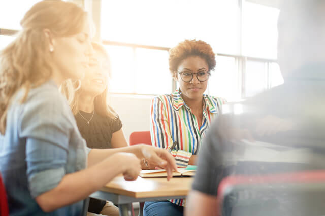 A group of professionals in a meeting.