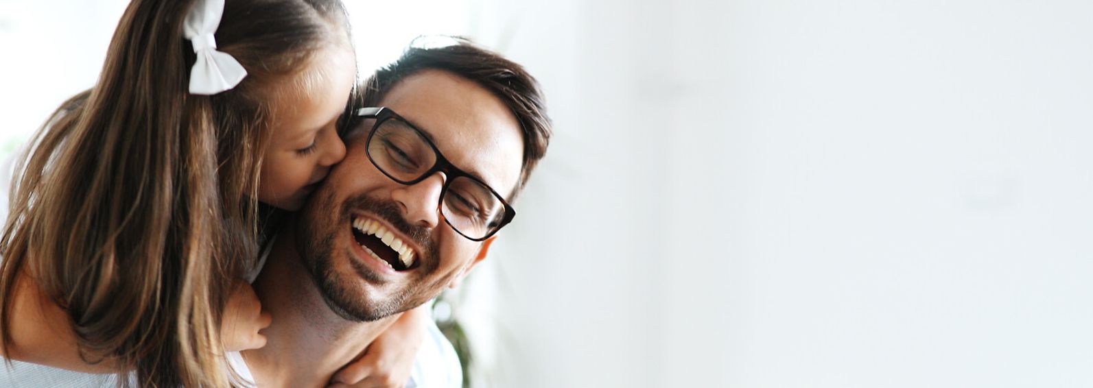 Father and daughter laughing