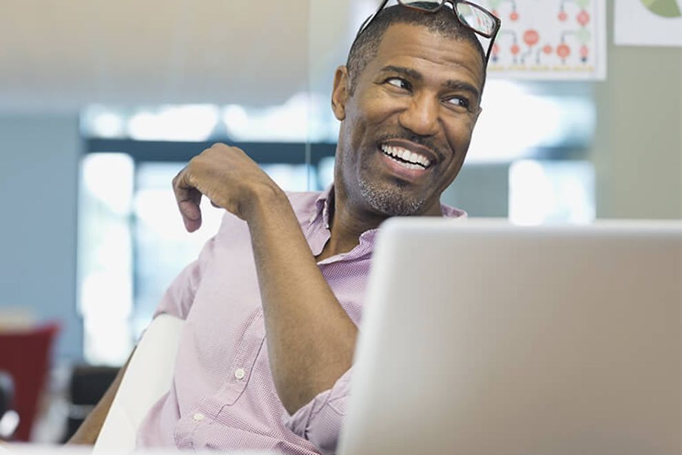 Man at a computer in an office